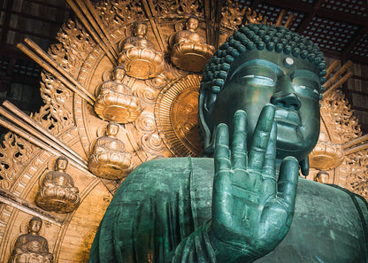 Close-up view of the Great Buddha of Nara, Japan, capturing the statue’s timeless presence and weathered details.